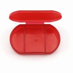 A red pill organiser with three compartments, featuring a hinged lid. It has a simple, smooth design.