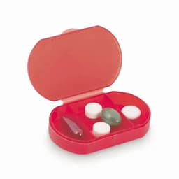 A pill organiser with a red case, featuring three compartments containing various pills in different shapes and sizes.