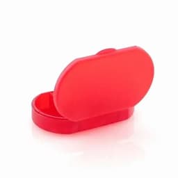 A red, oval-shaped container with a hinged lid, designed for storage or organisation.