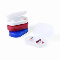 A stack of three pill containers in red, blue, and white, with one container open showing pills inside.