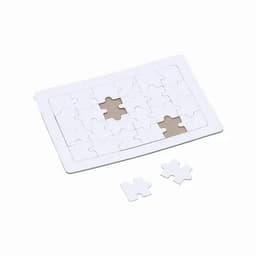 A jigsaw puzzle with several pieces missing, featuring a predominantly white design and two spare puzzle pieces.
