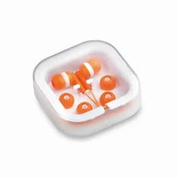 A pair of orange earbuds with multiple ear tips displayed in a white square case.