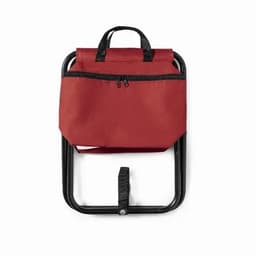 A red foldable chair with a zipped pocket and a black metal frame. It features a handle for easy carrying.