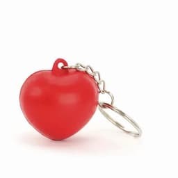 A red heart-shaped keychain with a silver keyring attached.