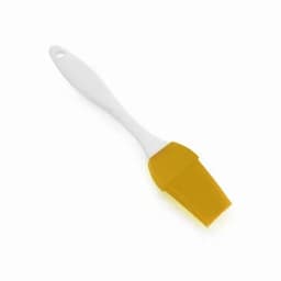 A silicone brush with a white handle and a yellow bristle head, suitable for spreading and applying sauces.