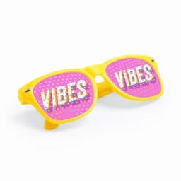 A pair of yellow sunglasses with pink lenses featuring the word "VIBES" in bold typography.