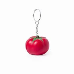 A keychain in the shape of a red tomato with a green stem. It has a metal chain and ring attached.