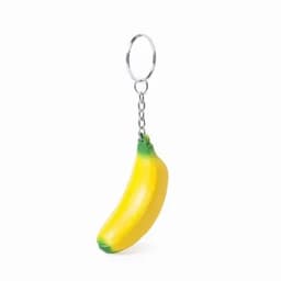 A banana-shaped keychain in yellow and green, attached to a metal keyring.