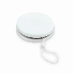A white yo-yo with a string attached, featuring a smooth circular design. It has a simple, minimalist appearance.