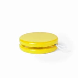 A yellow yo-yo with a smooth, glossy finish and a string for playing.
