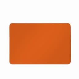 An orange placemat with a smooth surface, featuring a simple rectangular shape.