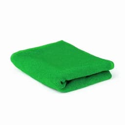 A folded green towel made of textured fabric, displayed on a white background.