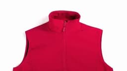 A red sleeveless vest with a high collar and a front zip. The vest has no visible logos or branding.