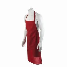 A red apron on a mannequin, featuring a pocket and adjustable neck strap. The fabric has a textured appearance.
