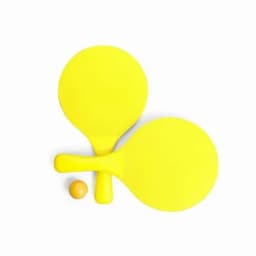 A set of yellow paddle bats with a small orange ball placed between them.