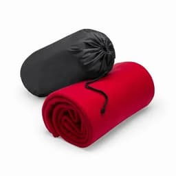 A rolled red blanket with a black carrying pouch, featuring a drawstring closure.
