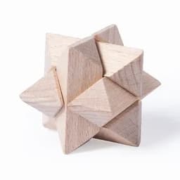 A wooden puzzle toy shaped like a star, featuring multiple triangular protrusions and a natural light wood finish.