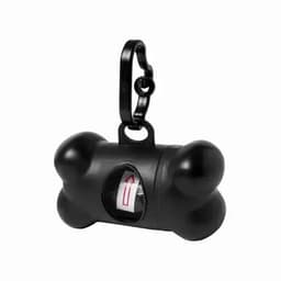 A black bone-shaped dispenser with a clip, featuring a visible compartment for bags.