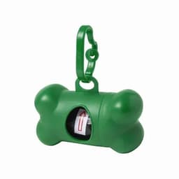 A green dog waste bag dispenser shaped like a bone, with a convenient clip for attachment and a visible roll of bags inside.