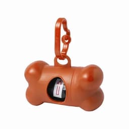 A dog waste bag dispenser in an orange bone shape with a clip for attachment. Contains a roll of waste bags.