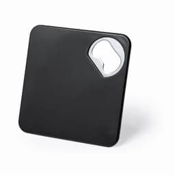 A black bottle opener with a square design and a circular opening for caps. It has a simple, minimalist style.