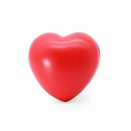 A heart-shaped object in bright red, featuring a smooth, shiny surface. It has no visible branding.