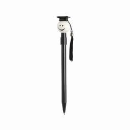 A black pen with a smiling graduation cap topper and a tassel attached.