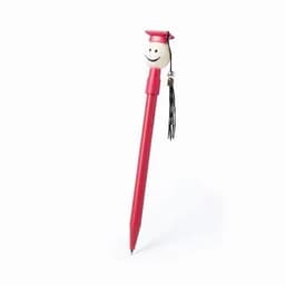 A red pen featuring a graduation cap topper and a smiley face, with a tassel attached.