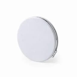 A round, white compact mirror with a smooth surface and a metal hinge. Features a simple design without visible branding.