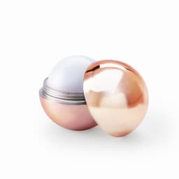 A shiny, rose gold round container with a silver interior, partially opened, resembling an egg shape.
