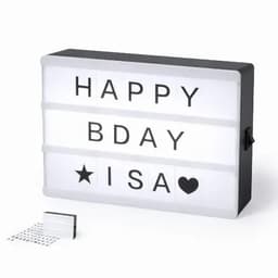 A lightbox with a black frame displaying black letters on a white background, featuring a star and heart symbol.