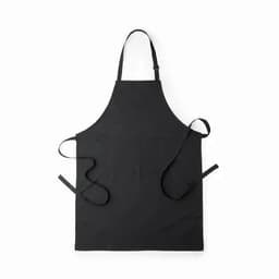A black apron with adjustable straps and a front pocket, designed for cooking or crafting.