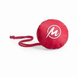 A red round promotional product with a white logo and a attached string.
