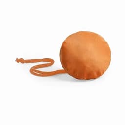 An orange promotional product with a round, soft design and a long attached strap. It features a logo.