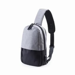 A grey and black sling backpack with a single strap and multiple zippered compartments. It has a logo on the front.