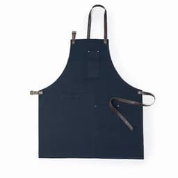 A navy blue apron featuring leather straps and multiple pockets for storage.