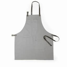 A grey apron with leather straps and multiple pockets, designed for cooking or crafting activities.