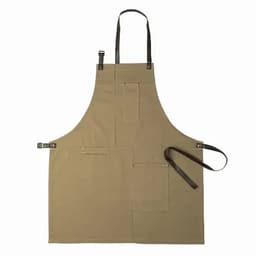 A beige apron with leather straps and multiple pockets for tools or utensils.