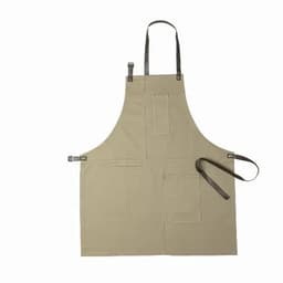 A beige apron featuring multiple pockets and leather straps for adjustment. It has a simple and functional design.