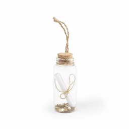 A glass bottle with a cork stopper, twine, and colourful stars inside, holding a rolled paper tied with gold string.