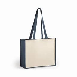 A tote bag featuring a cream body with navy blue handles and trim. The bag has a simple design and a logo.