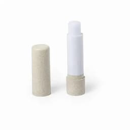 A lip balm container with a beige outer tube and a white inner tube, with the cap off. Branding visible.