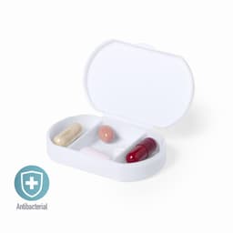 A white pillbox with four capsules in various colours: beige, pink, red, and brown. It features a logo.