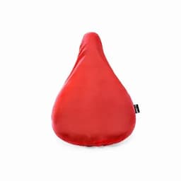 A red, teardrop-shaped bean bag with a smooth finish and a tag on one side.