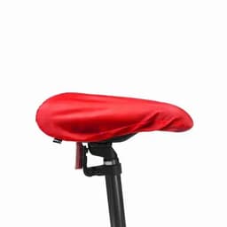 A bike seat cover in vibrant red, fitted snugly over a black bike seat with a branding tag visible.