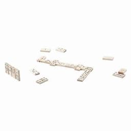 A set of dominoes arranged on a surface, featuring white tiles with black dots.