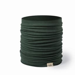 A green tubular accessory made of organic cotton with a textured, gathered design and a small branding tag.
