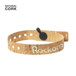 A natural cork belt in a tan colour with circular cut-outs and a black fastening mechanism. It has a logo on it.