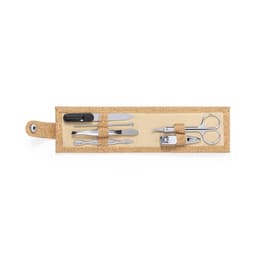 A grooming kit featuring silver tools like scissors, a nail clipper, and tweezers, set in a cork casing.