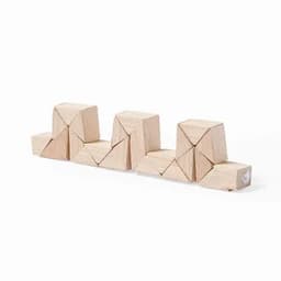 A set of wooden building blocks in natural colour arranged in a wave pattern, featuring various geometric shapes.
